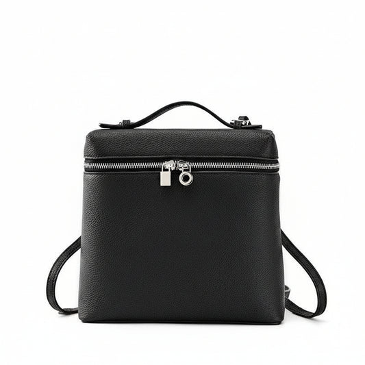 Black leather backpack with top handle, silver zipper, and lock on white background