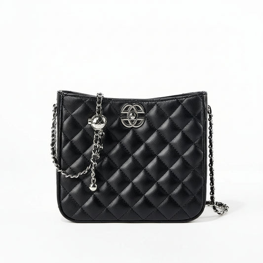 Black quilted leather crossbody bag with silver chain strap and metal logo on white background