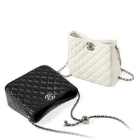 Quilted black and white leather handbags with chain straps on white background