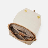 Open tan leather crossbody bag with striped fabric lining and snap closure on white background