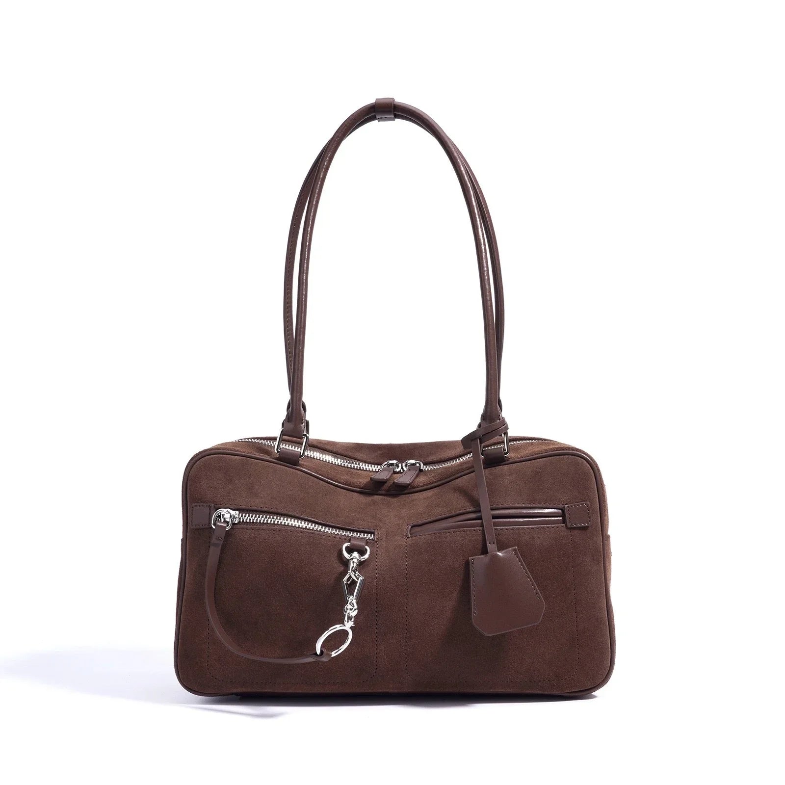 Brown suede shoulder bag with double handles, silver zippers, and front keychain charm