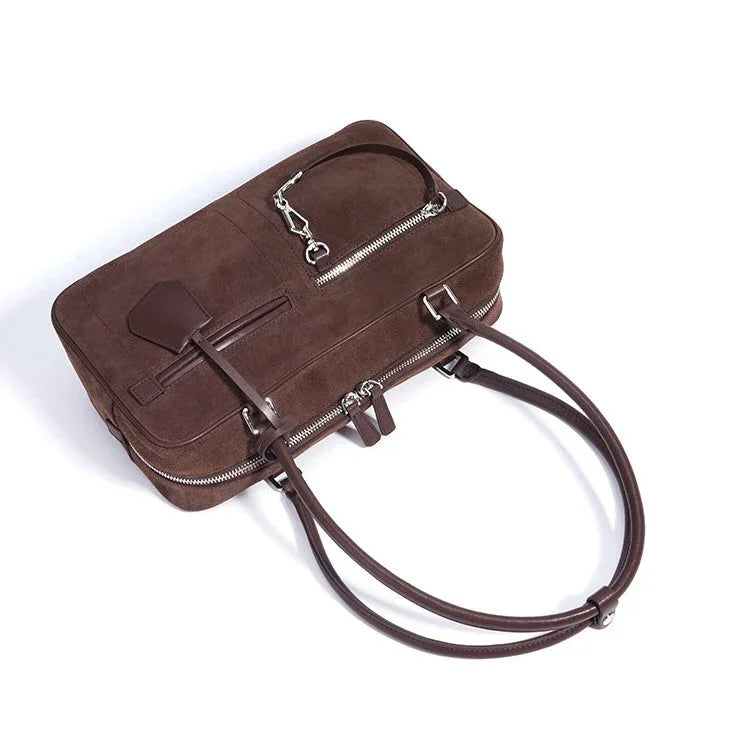 Brown suede leather laptop bag with double handles and exterior zippered pocket