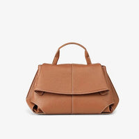 Brown leather handbag with top handle against white background
