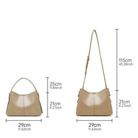 Beige leather shoulder bag with size dimensions and adjustable strap shown