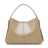 Beige leather hobo handbag with a single strap and gold-tone hardware on white background