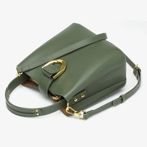Olive green leather crossbody bag with gold buckle and adjustable strap on white background