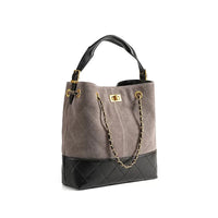 Quilted gray and black bucket handbag with gold chain strap and leather handle