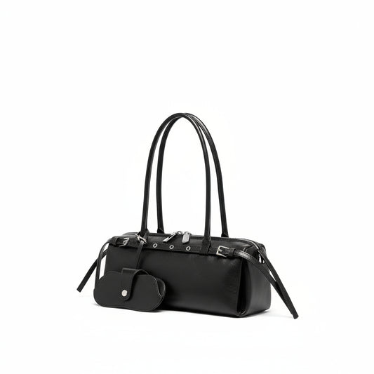 Black leather barrel shoulder bag with double handles and matching key pouch, white background