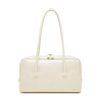 Cream rectangular leather handbag with double handles and zip closure on white background