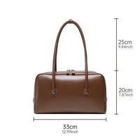 Brown leather shoulder bag with double handles and dimensions 33x20x25cm