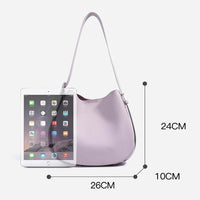 Light purple shoulder bag with iPad for scale, bag size 26x24x10 cm on white background