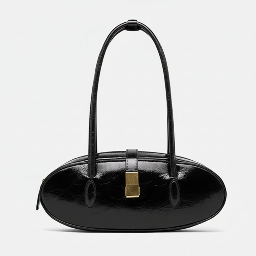 Black oval leather handbag with gold clasp and double shoulder straps on white background