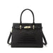 Black crocodile embossed leather handbag with gold hardware and top handles