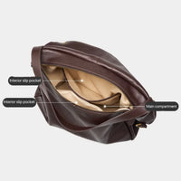 Brown leather shoulder bag with labeled interior slip pockets and main compartment