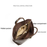 Brown leather tote bag with labeled main compartment, hidden pocket, and interior slip pocket