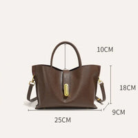 Brown leather handbag with gold hardware, top handle, dimensions 25x18x9 cm, 10 cm handle