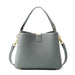 Gray leather handbag with gold hardware and detachable shoulder strap on white background