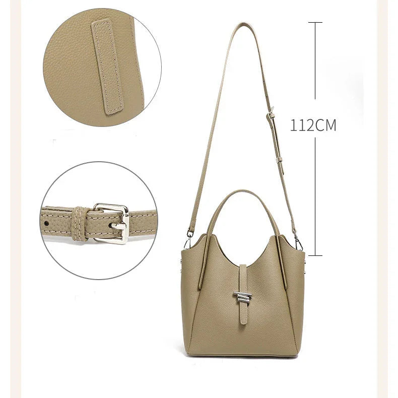 Beige leather bucket bag with adjustable shoulder strap and silver buckle, 112cm length