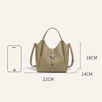 Khaki leather handbag with top handle, shoulder strap, and size measurements 22x18x14cm