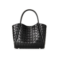 Black woven leather tote bag with double handles on white background