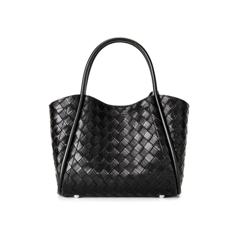 Black woven leather tote bag with double handles on white background