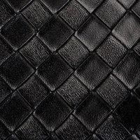 Black woven leather texture with diamond pattern, luxury fashion material close-up