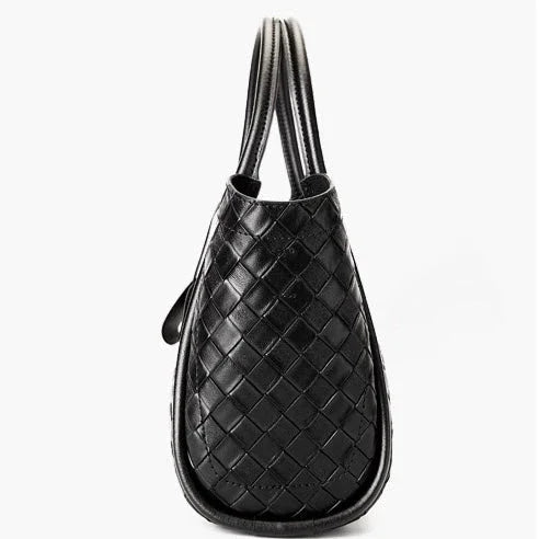 Black woven leather handbag with double handles on a white background