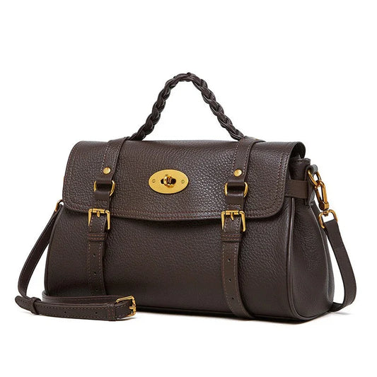 Dark brown leather handbag with gold buckles and braided top handle