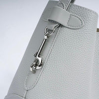 Light grey textured leather handbag with silver clasp detail