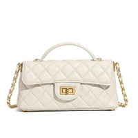 White quilted leather handbag with gold chain strap and gold turn-lock closure