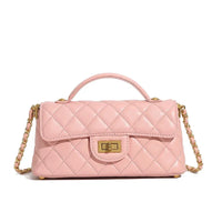 Quilted pink leather handbag with gold chain strap and top handle on white background