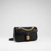 Black quilted leather shoulder bag with gold chain strap and gold clasp, luxury purse