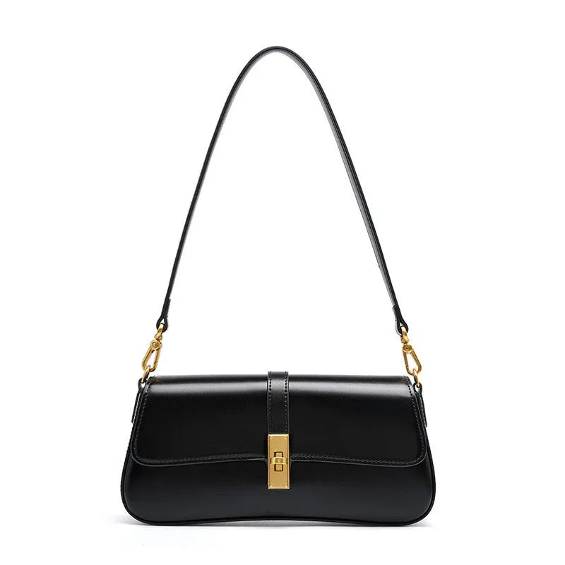 Black leather shoulder bag with gold clasp and hardware on white background