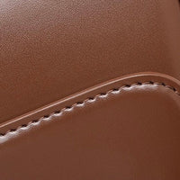 Close-up of brown leather bag with neat stitching detail