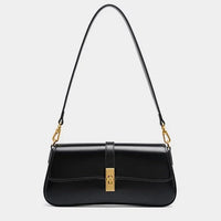Black leather shoulder bag with gold clasp and hardware on white background