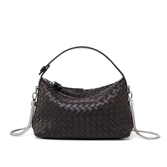 Black woven leather shoulder bag with silver chain strap on white background