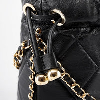 Quilted black leather bag with gold chain strap and drawstring closure detail