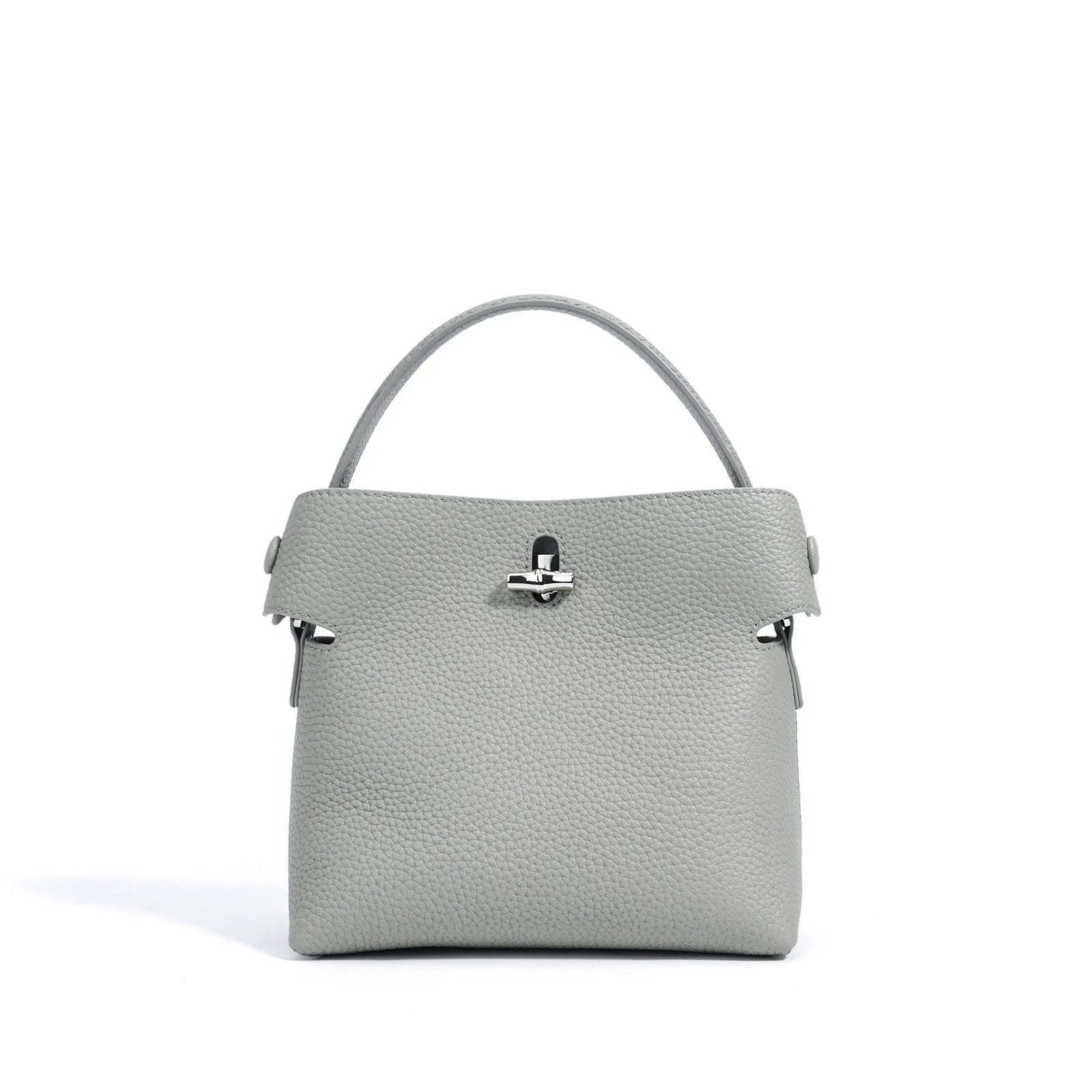 Gray leather handbag with top handle and silver clasp on white background