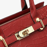 Red crocodile-embossed leather handbag with gold hardware and secure lock detail