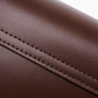 Close-up of brown leather with stitching, premium leather texture detail