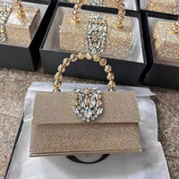 Gold crystal evening handbag with jeweled handle and rhinestone clasp, elegant gift box