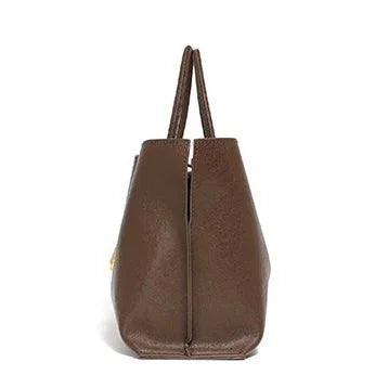 Side view of brown leather tote bag with double handles on white background
