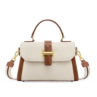 Beige and brown leather handbag with gold hardware and detachable shoulder strap