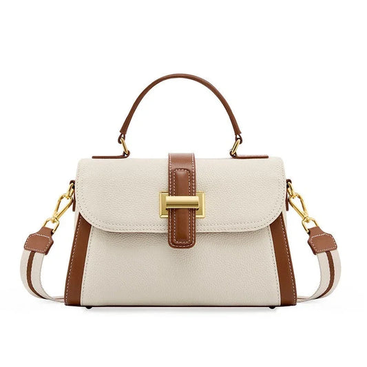 Beige and brown leather handbag with gold hardware and detachable shoulder strap
