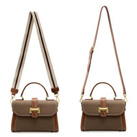 Brown leather handbag with top handle, gold buckle, and two adjustable shoulder straps