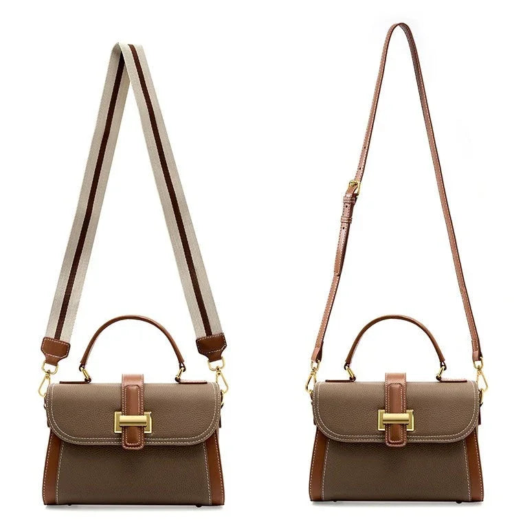 Brown leather handbag with top handle, gold buckle, and two adjustable shoulder straps