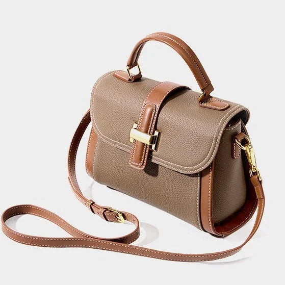 Taupe and brown leather handbag with gold buckle and adjustable shoulder strap