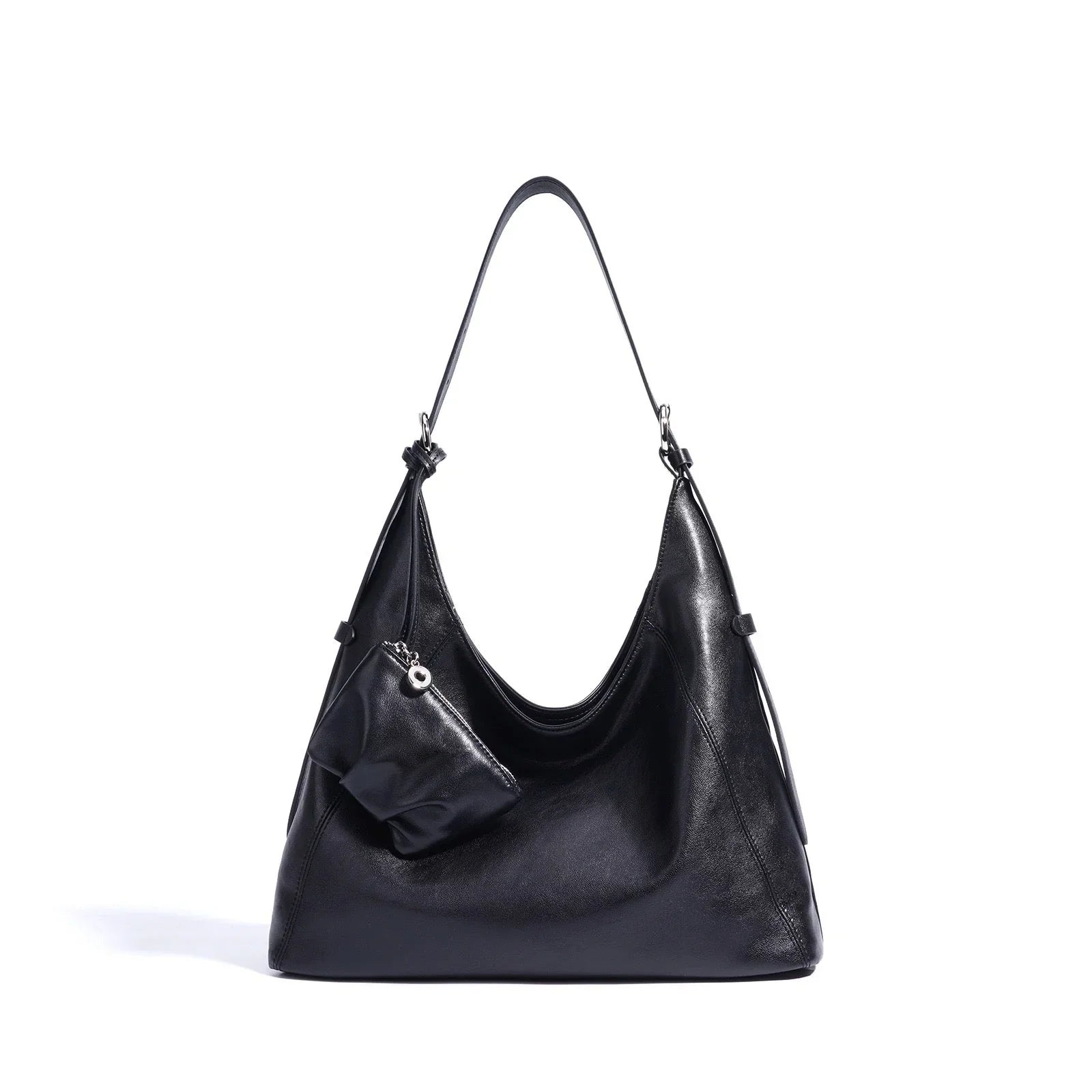 Black leather hobo shoulder bag with small attached pouch on white background