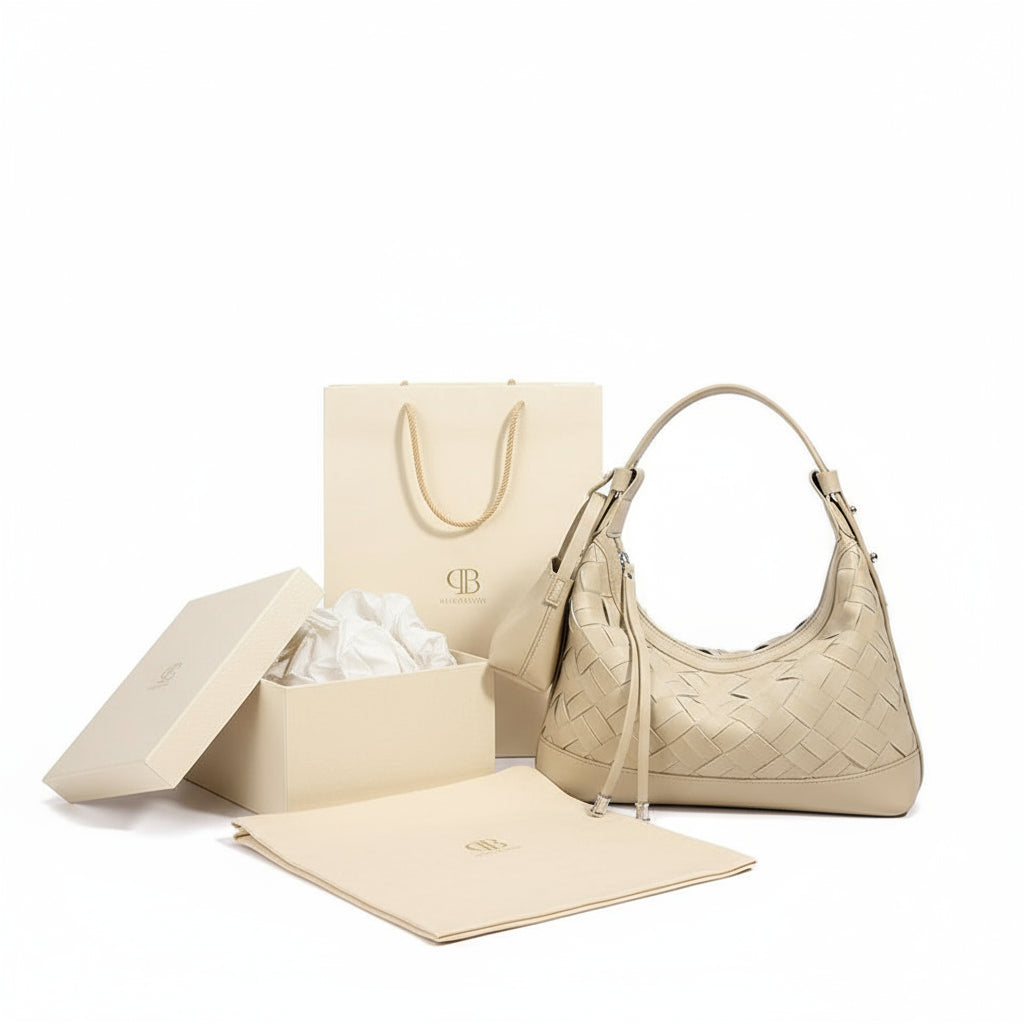 Beige woven leather shoulder bag with mini pouch, hobo style, on white background