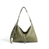 Olive green leather hobo bag with single shoulder strap and minimalist silver hardware